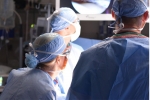 Who is a candidate for total shoulder arthroplasty (total shoulder replacement)?